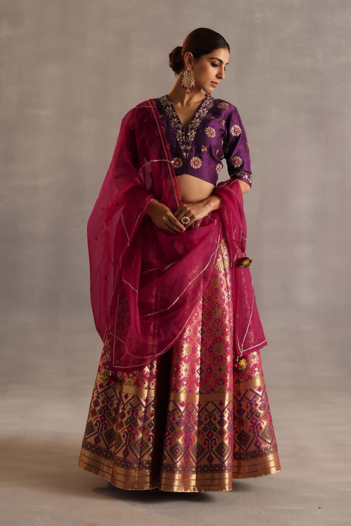 Saras purple and rani pink lehenga set