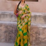 Tara green pre-draped printed sari and blouse