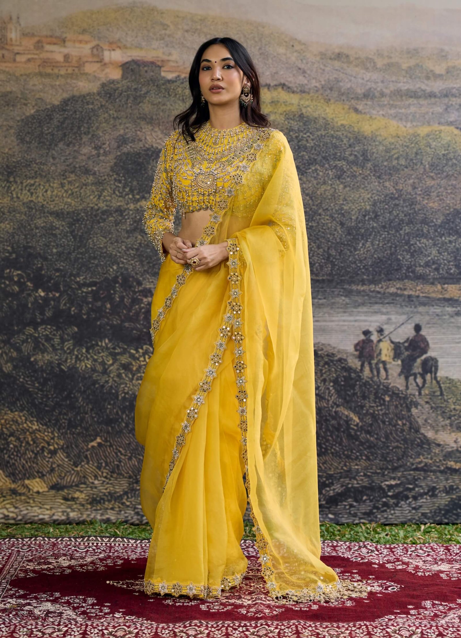 Peela tara yellow organza sari and blouse