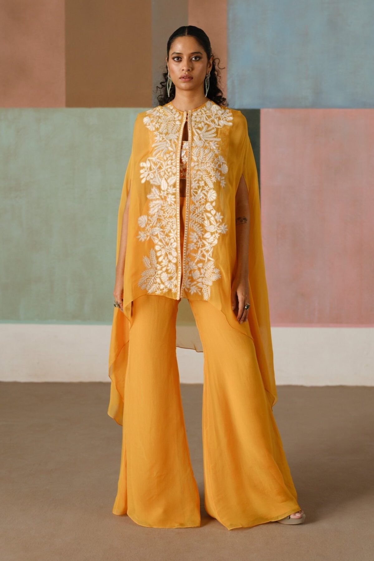 Aurea tangerine cape and flared pant set