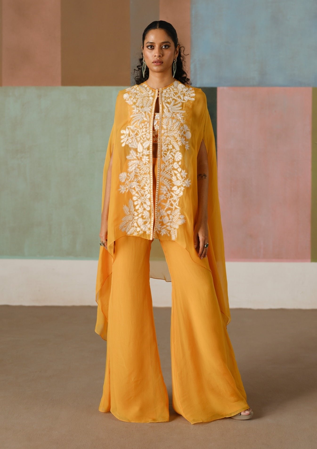 Aurea tangerine cape and flared pant set