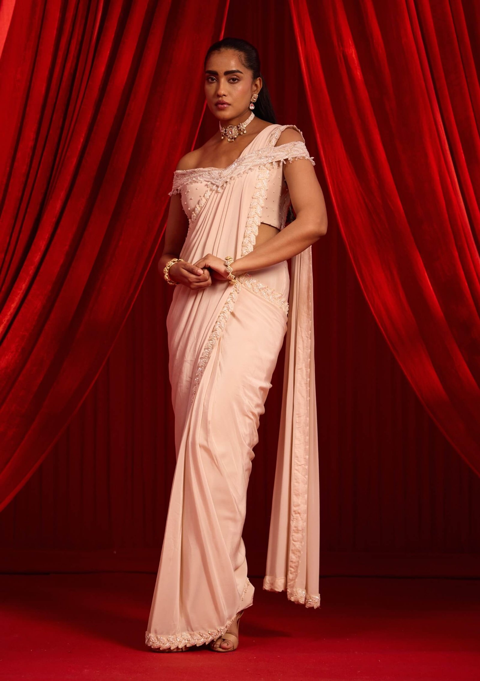 Salmon pink sanyoga gulabi sari and blouse