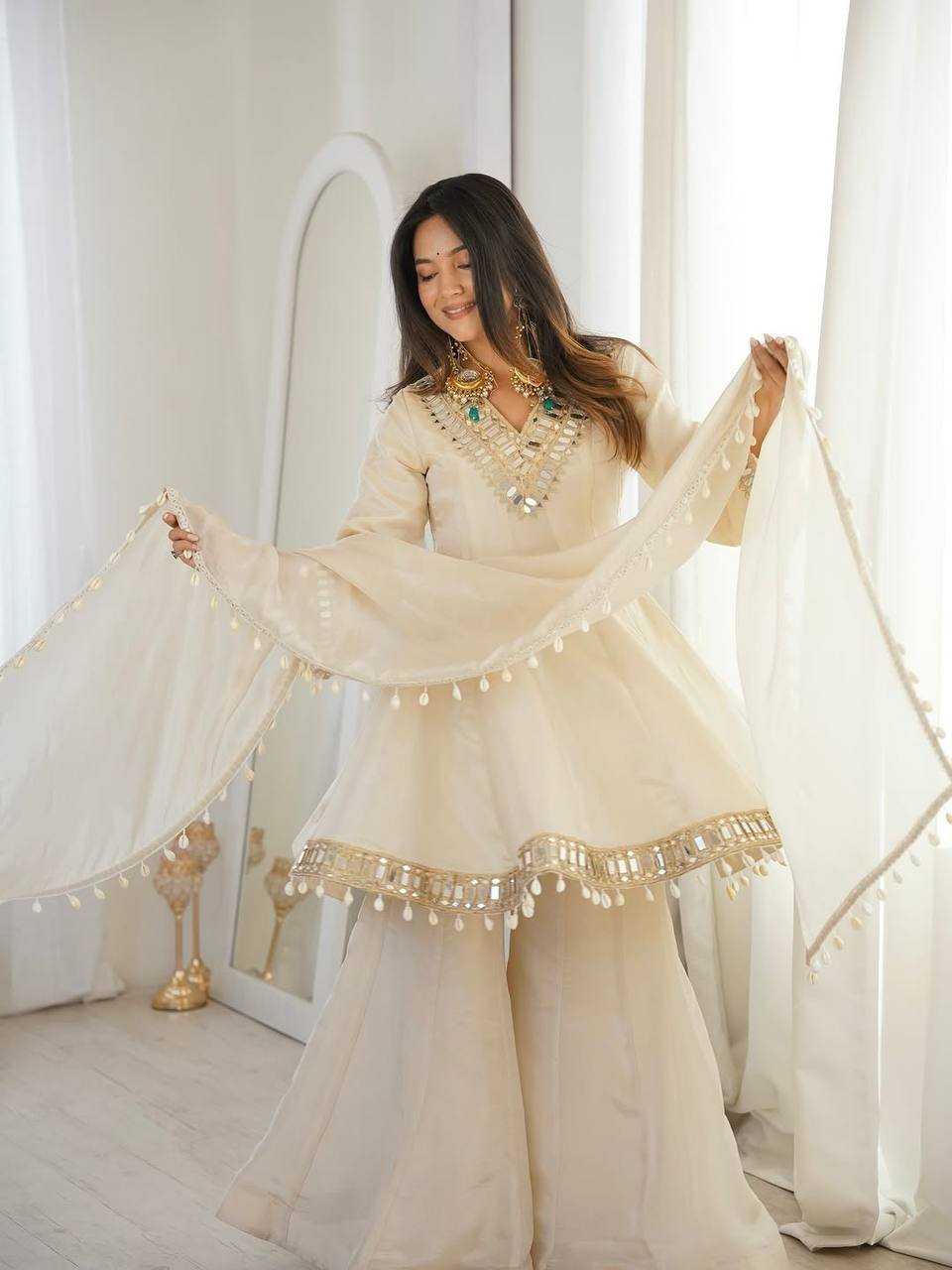 Beige Organza Silk Sharara Suit with Mirror Work Lace Border