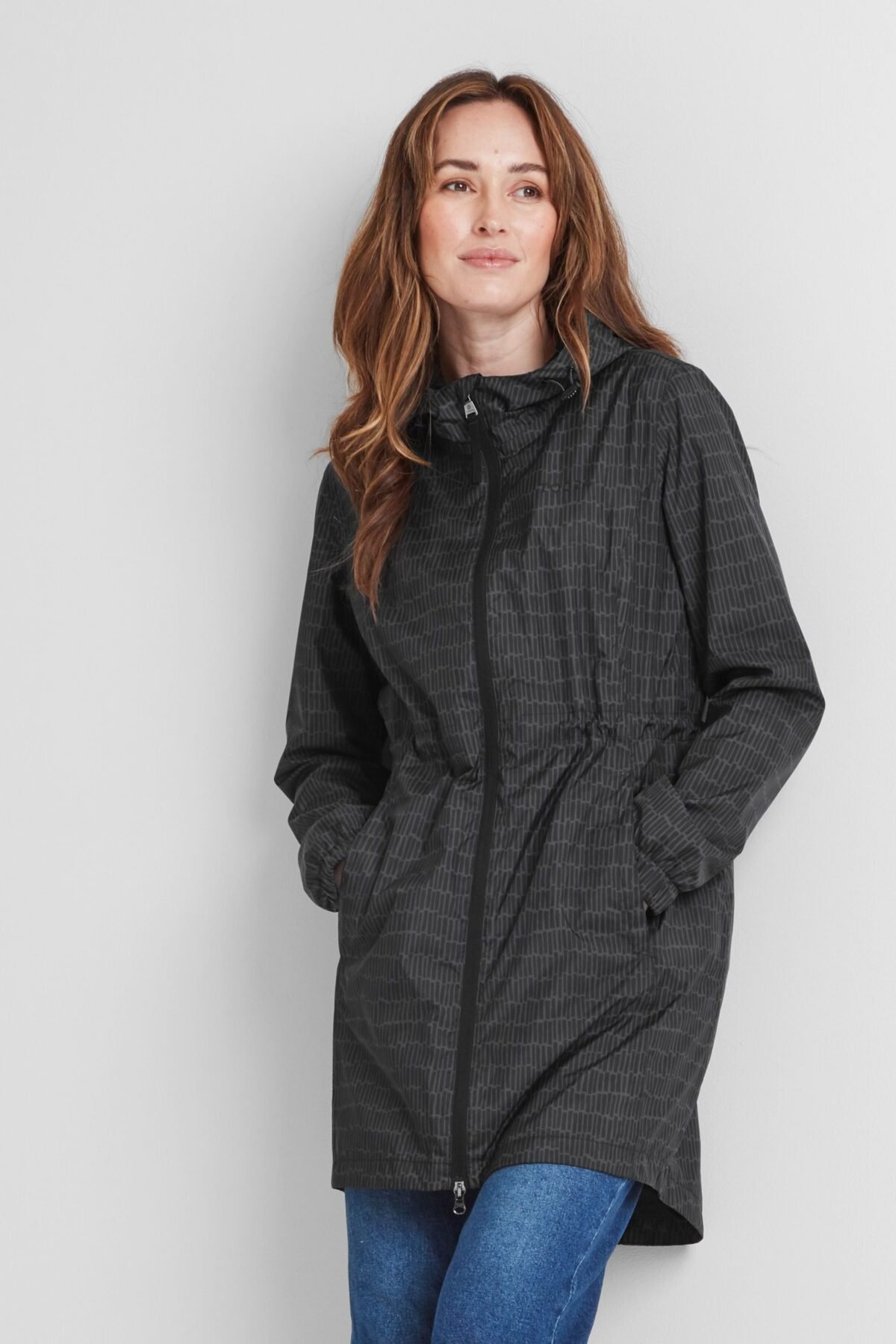 Women's Black Waterproof Packable Rain Jacket Lightweight Travel Friendly Design